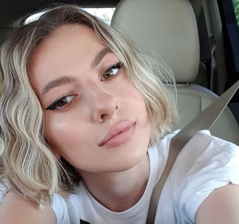 Cea mai provocatoare imagine cu Lidia Buble. În cel mai sumar body, cu posteriorul la vedere